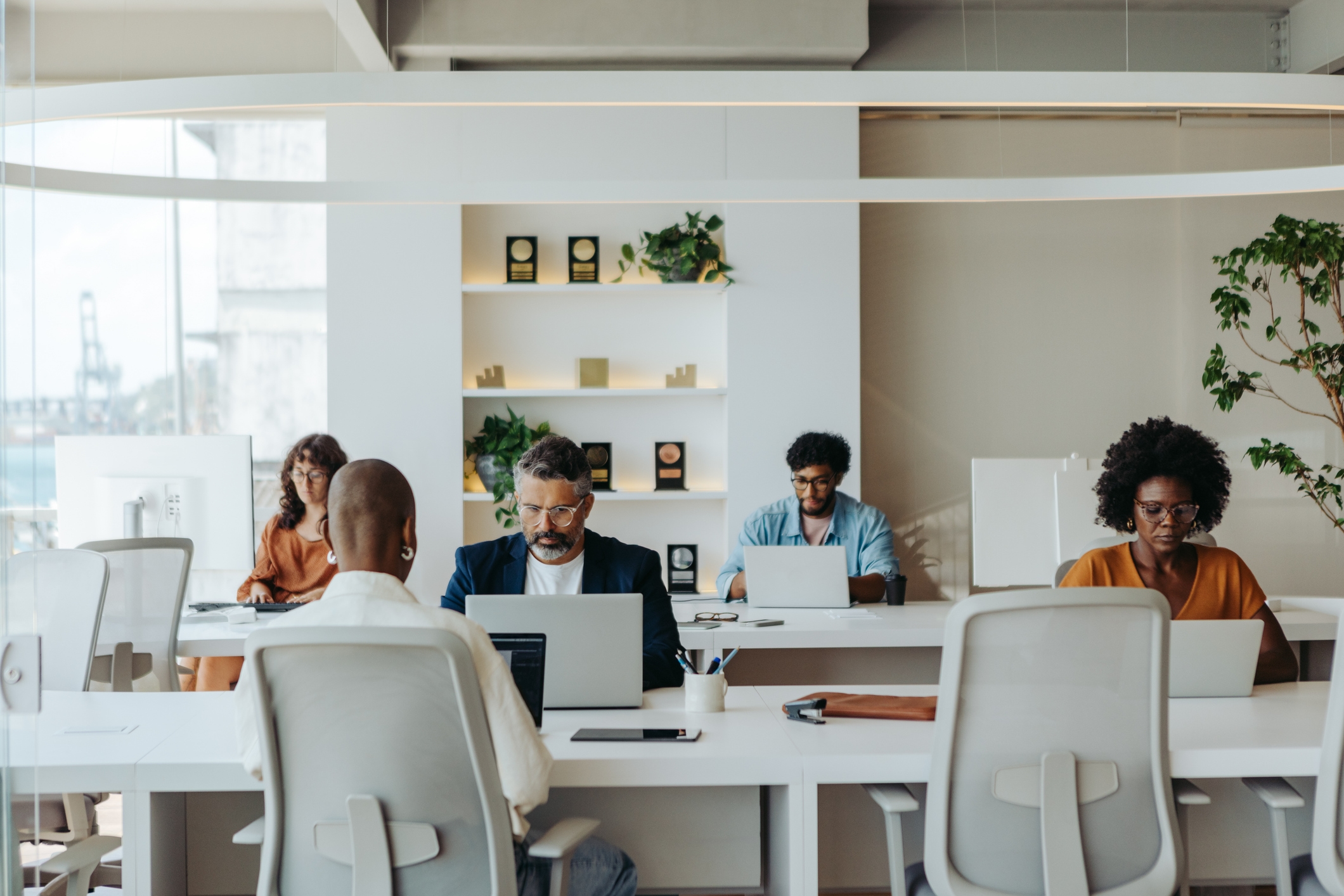 diverse group of business professionals collaborating in a coworking office